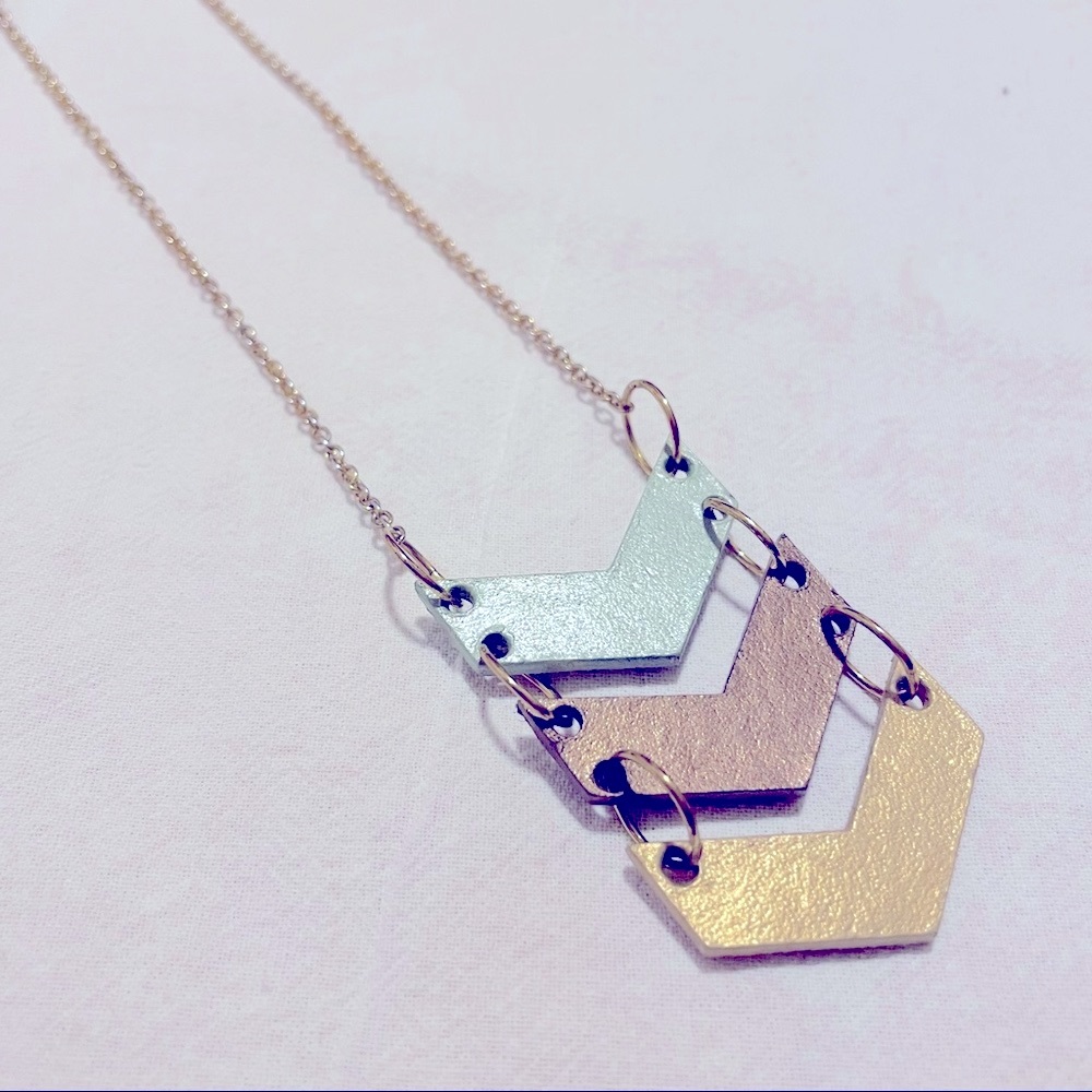 Long gold leather chevron pendant necklace